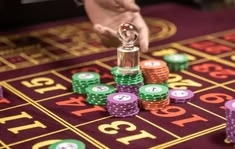 vegas wins slot casino presented on mobile device in Pakistan with slots and live games